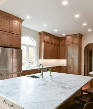 A Maple Kitchen featuring Lexington cabinet doors in Caramel from Wellborn Cabinet, Inc.