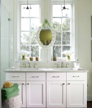 A Maple Bath featuring Hanover cabinet doors in Glacier from Wellborn Cabinet, Inc.
