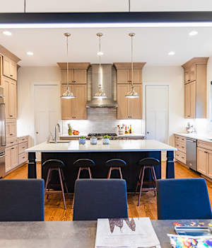 A Maple Kitchen featuring Galena Square cabinet doors in Shale and Nightfall from Wellborn Cabinet, Inc.