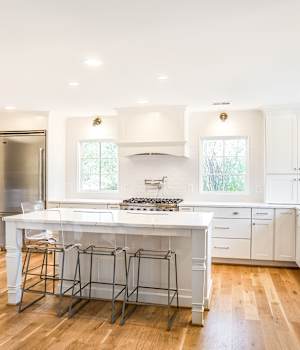 A Maple Kitchen featuring Hanover cabinet doors in Oyster White from Wellborn Cabinet, Inc.