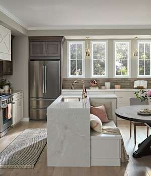 A Maple and Medium Density Fiberboard Kitchen featuring Ridgebrook cabinet doors in Peppermill and Alabaster from Wellborn Cabinet, Inc.