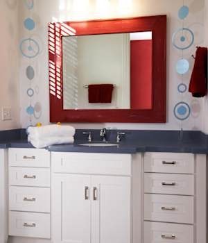 A Maple Bath featuring Hanover cabinet doors in Glacier from Wellborn Cabinet, Inc.