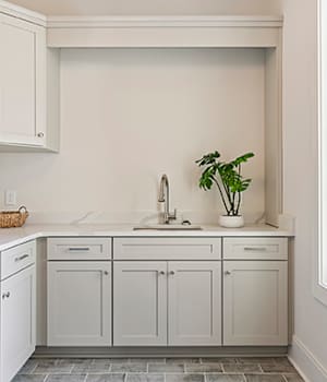 gray laundry room cabinets