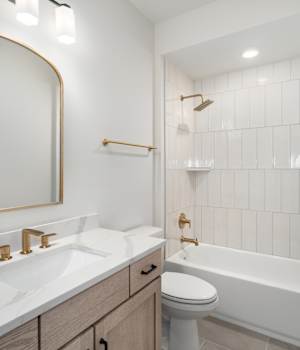 A Oak Bath featuring Florence cabinet doors in Boardwalk from Wellborn Cabinet, Inc.