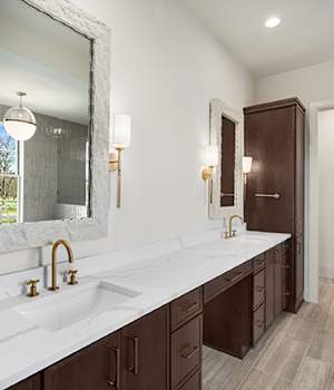 A Oak Bath featuring Florence cabinet doors in Drift from Wellborn Cabinet, Inc.