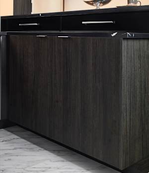 Midtown is Decorative Laminate Veneer Door door group with a Slab cabinet door from Wellborn Cabinet.