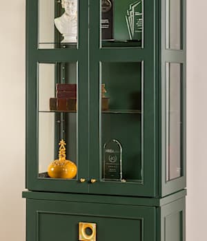 These Green and Dark cabinets for the 2025 Exhibit Booth home were provided by Wellborn Cabinet, Inc.