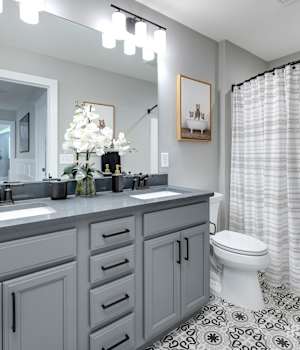 A Maple Bath featuring Essex cabinet doors in Willow from Wellborn Cabinet, Inc.
