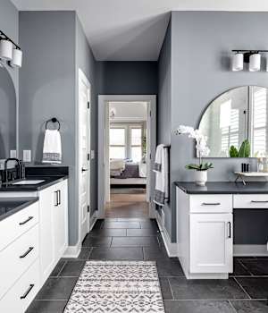 A Maple Bath featuring Hanover cabinet doors in Bright White from Wellborn Cabinet, Inc.
