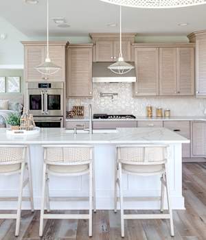 A Maple Kitchen featuring Antigua cabinet doors in Shale and Glacier from Wellborn Cabinet, Inc.