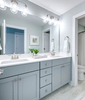 A Medium Density Fiberboard Bath featuring Galena Square cabinet doors in Aqua from Wellborn Cabinet, Inc.