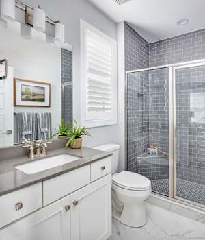 A Maple Bath featuring Lexington cabinet doors in Glacier from Wellborn Cabinet, Inc.