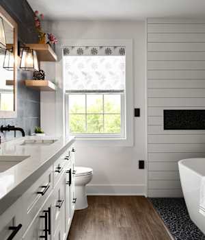 A Medium Density Fiberboard Bath featuring Hancock cabinet doors in Bright White from Wellborn Cabinet, Inc.