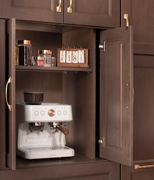 Hide Small Appliances with a Tall Cabinet Featuring Pocket Doors