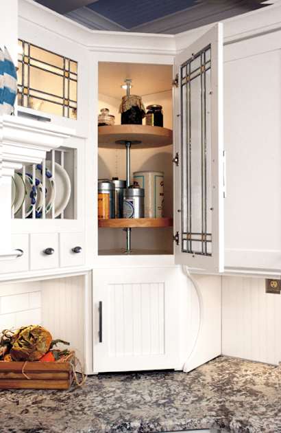 lazy susan in white kitchen cabinet