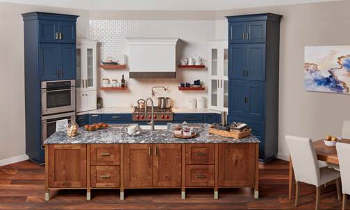 A Medium Density Fiberboard and Character Cherry Kitchen featuring Bishop and Bristol cabinet doors in Sapphire, Bright White, and Light Charcoal from Wellborn Cabinet, Inc.