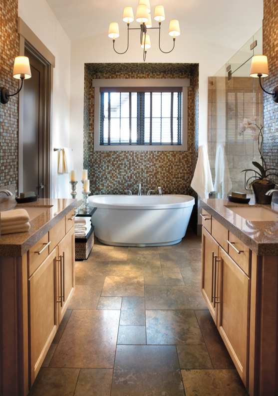 A Maple Bath featuring Henlow Square cabinet doors in Ginger from Wellborn Cabinet, Inc.