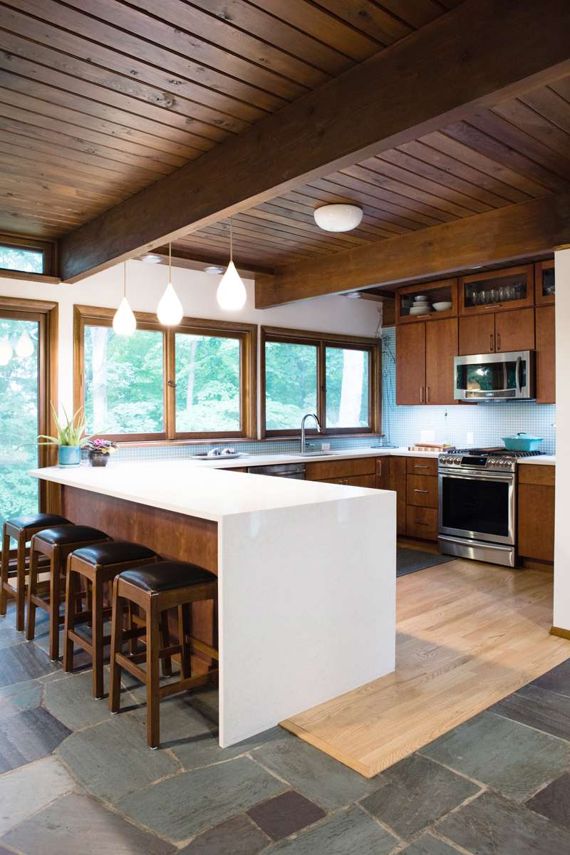 A Cherry Kitchen featuring Milan cabinet doors in Light from Wellborn Cabinet, Inc.