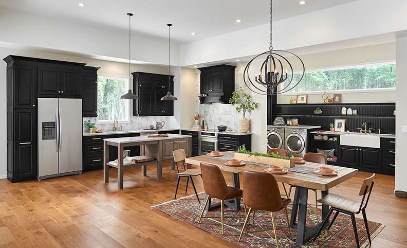 A Maple and Medium Density Fiberboard Kitchen featuring Concord and Hartford cabinet doors in Drift Slate and Onyx from Wellborn Cabinet, Inc.