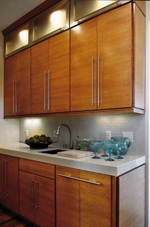 A Oak Hutch and Refreshment Areas featuring Barcelona cabinet doors in Medium from Wellborn Cabinet, Inc.