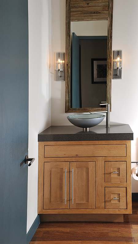 A Maple Bath featuring Hanover Inset cabinet doors in Ginger from Wellborn Cabinet, Inc.