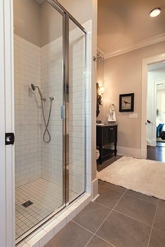 A Maple Bath featuring Seville Square cabinet doors in Onyx from Wellborn Cabinet, Inc.