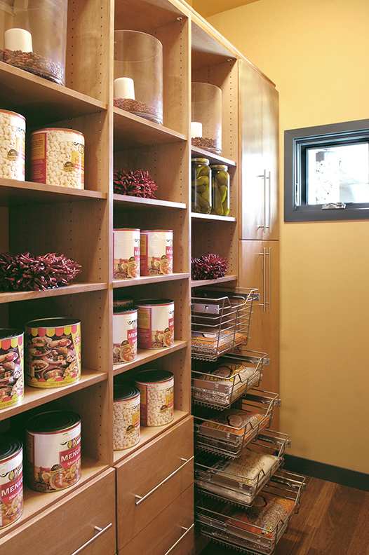 A Maple Pantry featuring Milan cabinet doors in Ginger from Wellborn Cabinet, Inc.