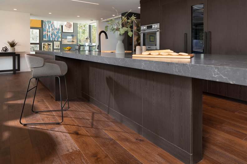 Arcadia is Decorative Laminate Veneer Door door group with a Slab cabinet door from Wellborn Cabinet.