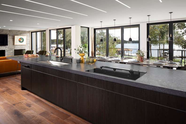 Arcadia is Decorative Laminate Veneer Door door group with a Slab cabinet door from Wellborn Cabinet.