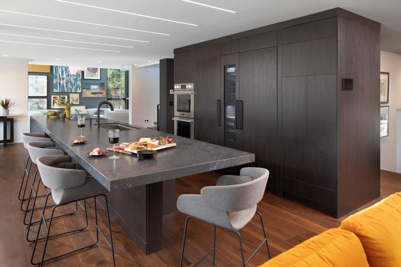 Arcadia is Decorative Laminate Veneer Door door group with a Slab cabinet door from Wellborn Cabinet.