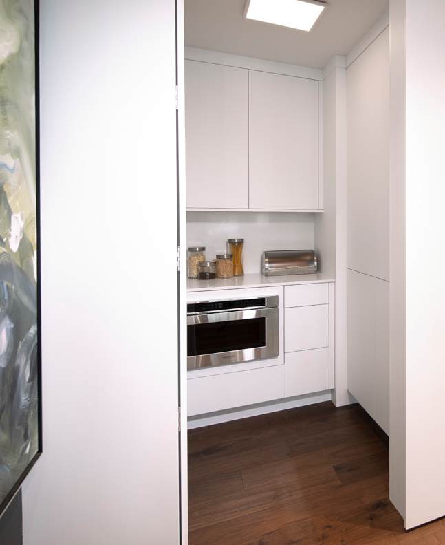 Midtown is Decorative Laminate Veneer Door door group with a Slab cabinet door from Wellborn Cabinet.