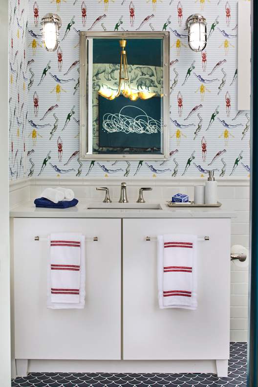 A Maple Bath featuring Milan cabinet doors in Oyster White from Wellborn Cabinet, Inc.