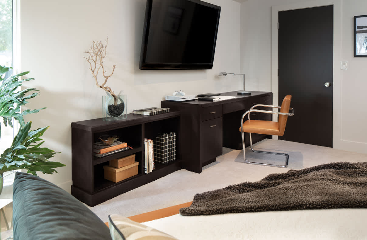 A Oak Bedroom featuring Milan cabinet doors in Nightfall from Wellborn Cabinet, Inc.